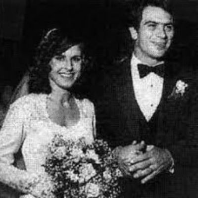 Both Kimberlea Cloughley and Tommy Lee Jones are on their wedding dress in this monochrome image.
